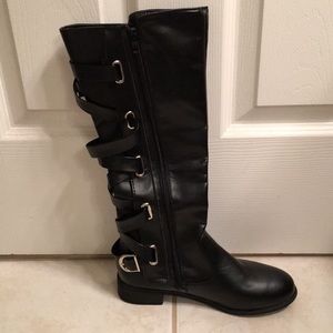 Black knee high boots w/ strap lacing & zippers.